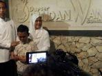 jokowi-dan-ibu-negara-iriana-bersama-gultom-james-leonard.jpg