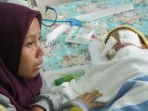sinta-27-ditetapkan-sebagai-tersangka-penganiayaan-putri-kandungnya-calista-15-bulan_20180324_140912.jpg