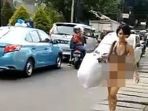 wanita-bugil-berulah-lagi-di-jalanan-di-jakarta_20170606_090414.jpg